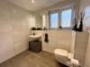 Barrierefreie Souterrain-Wohnung in gehobener Ausführung - Badezimmer